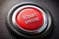 Start engine red blank button on black plastic background Royalty Free Stock Photo