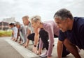 Start, fitness or senior people in a marathon race with running goals in workout or runners exercise. Motivation, focus