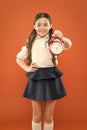 Start lesson. time to go to school. School time. Happy girl hold alarm clock counting for lunch time. Children education