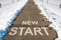 Start line on the highway with melting snow Royalty Free Stock Photo