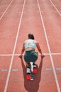 Start, running and fast with woman on race track for sports, competition and marathon. Exercise, health and wellness Royalty Free Stock Photo
