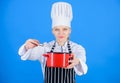 Start slowly whisking whipping or beating cream. Use hand whisk. Whipping cream tips and tricks. Woman professional chef Royalty Free Stock Photo