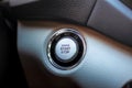 Start stop engine modern new technology car button, close up. Royalty Free Stock Photo