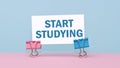 Start Studying - concept of text on business card on pink and blue background Royalty Free Stock Photo