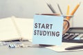 Start Studying - concept of text on sticky note