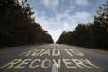 Start to live without alcohol addiction. Phrase ROAD TO RECOVERY on asphalt highway Royalty Free Stock Photo