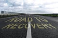 Start to live without alcohol addiction. Phrase ROAD TO RECOVERY on asphalt highway Royalty Free Stock Photo