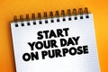 Start Your Day On Purpose text on notepad, concept background Royalty Free Stock Photo
