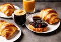 Start your day with a smile: a power-packed breakfast of fresh orange juice, latte and warm croissants