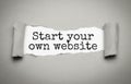 Start Your Own Website on white torn paper Royalty Free Stock Photo
