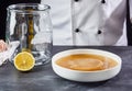 Starter liquid with scoby and sterilised glass jar Royalty Free Stock Photo