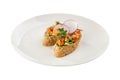 Starter with salmon tartare salad avocado on bread toast bruschetta isolated on white background Royalty Free Stock Photo