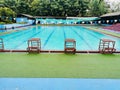 Starting block in a swimming pool with lenes of a competition Royalty Free Stock Photo