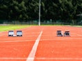 Starting blocks on light red running tracks lanes at track and field stadium Royalty Free Stock Photo