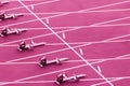 Starting blocks in track and field. Pink color filter Royalty Free Stock Photo