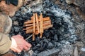 Starting the camp fire with kindling. Camping life Royalty Free Stock Photo