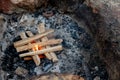 Starting the camp fire with kindling. Camping life