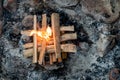 Starting the camp fire with kindling. Camping life Royalty Free Stock Photo