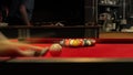 Starting a game of billiards in a family environment