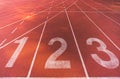 Starting line position of running track background texture, lane number 1, 2, 3. Business competitiveness conceptual Royalty Free Stock Photo