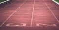 Red running track Synthetic rubber on the athletic stadium Royalty Free Stock Photo