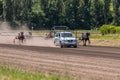 The starting machine on the racetrack before the start of the trotter race