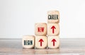 Starting a new beginning concept. The word new beginning on wooden cubes with a start button on yellow background Royalty Free Stock Photo