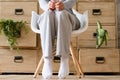 Start day apprehension man sit chair tiptoed Royalty Free Stock Photo