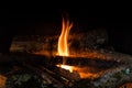 Starting up a fire inside a chimney Royalty Free Stock Photo