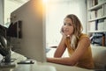 Starting your own business is no small feat. Portrait of a young woman working on a computer in her home office. Royalty Free Stock Photo