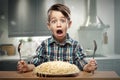 Startled yound boy with noodles Royalty Free Stock Photo