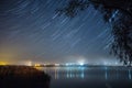 Startrails over the lake Royalty Free Stock Photo