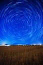 Startrails over a wheat field