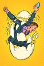 Startup business birth concept. businessman appears from the shell of an egg