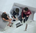 View from above of a group of people working with gadgets Royalty Free Stock Photo