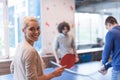 Startup business team playing ping pong tennis Royalty Free Stock Photo