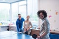 Startup business team playing ping pong tennis Royalty Free Stock Photo