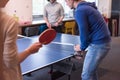 Startup business team playing ping pong tennis Royalty Free Stock Photo