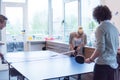 Startup business team playing ping pong tennis Royalty Free Stock Photo