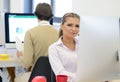 Startup business, young beautiful woman as software developer working on computer at modern office Royalty Free Stock Photo