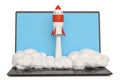 Startup concept with rocket flying out of laptop screen on white Royalty Free Stock Photo