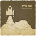 Startup concept with rocket vintage background Royalty Free Stock Photo