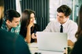 Startup diversity teamwork brainstorming meeting concept. business team coworkers working together at laptop. People working plann Royalty Free Stock Photo