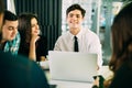 Startup diversity teamwork brainstorming meeting concept. People working planning start up. Group young people discussing in cafe. Royalty Free Stock Photo