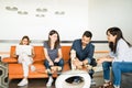 Startup employees playing jenga in break