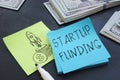 Startup funding is shown using the text