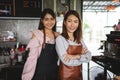 Portrait of young Asian adult opened new coffee shop as business partner