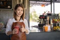 Startup new business Portrait of Asian female barista coffee shop Royalty Free Stock Photo