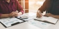 Startup people sitting together at office room table and balanci Royalty Free Stock Photo