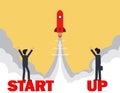 Startup rocket concept, Business startup work moments. Two businessmen stand on the word startup